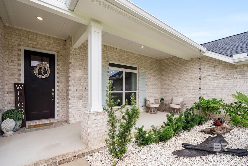Resort-style living starts in the backyard of this beautifully - photo 3