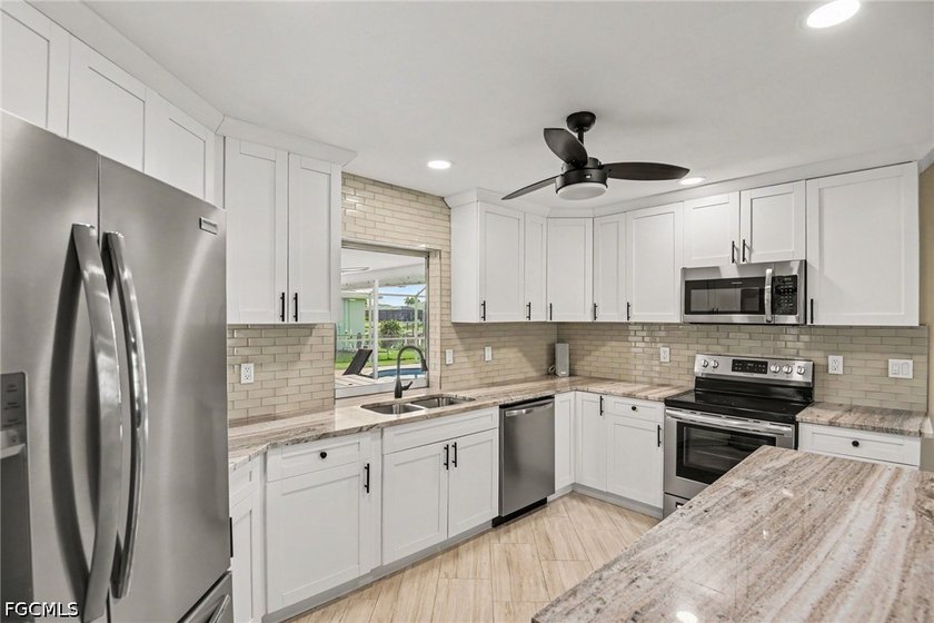 Beautifully maintained 3 bedroom, 2 bath waterfront pool home - photo 11
