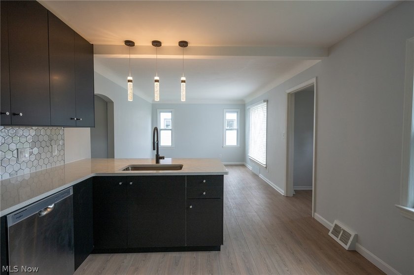 Completely renovated inside and out, this charming cape cod - photo 10