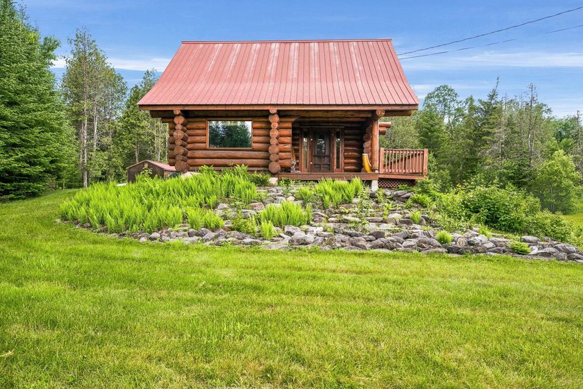 Unique in every way! This spectacular handcrafted full-log home - photo 5