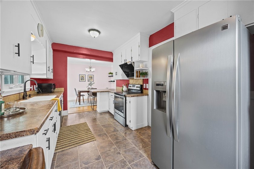 Welcome to this charming and beautifully maintained home located - photo 17