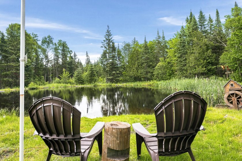 Unique in every way! This spectacular handcrafted full-log home - photo 7