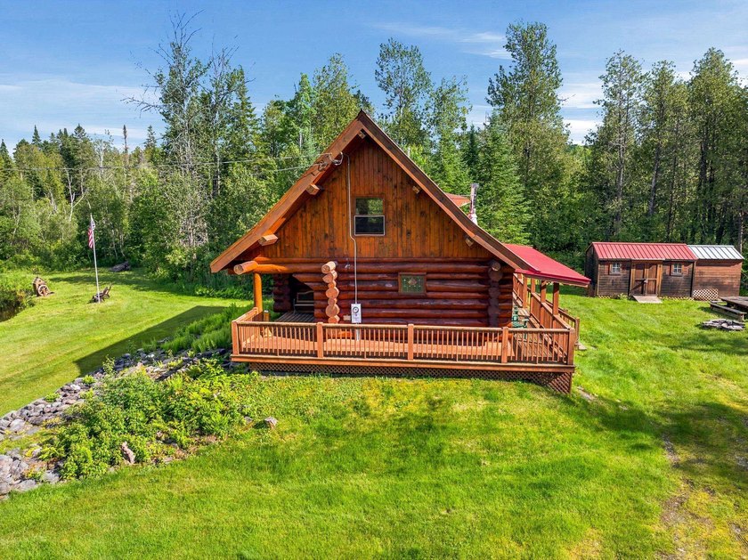 Unique in every way! This spectacular handcrafted full-log home - photo 9
