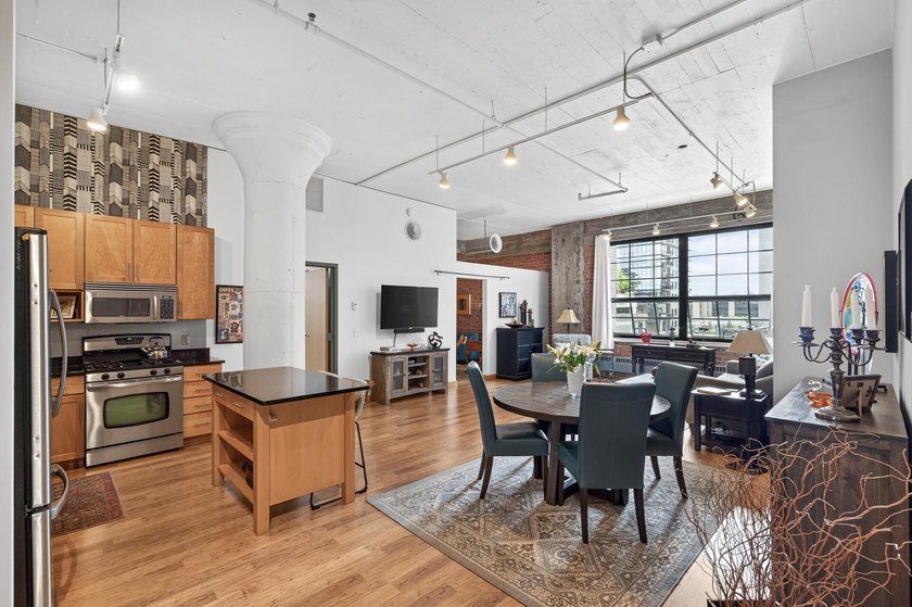 Rare 5th-floor corner loft at American Trio Lofts, filled with - photo 5