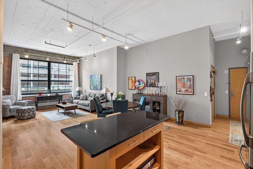 Rare 5th-floor corner loft at American Trio Lofts, filled with - photo 6