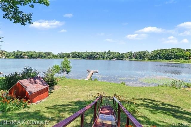 Escape to the peaceful living beauty of lake living in this - photo 22
