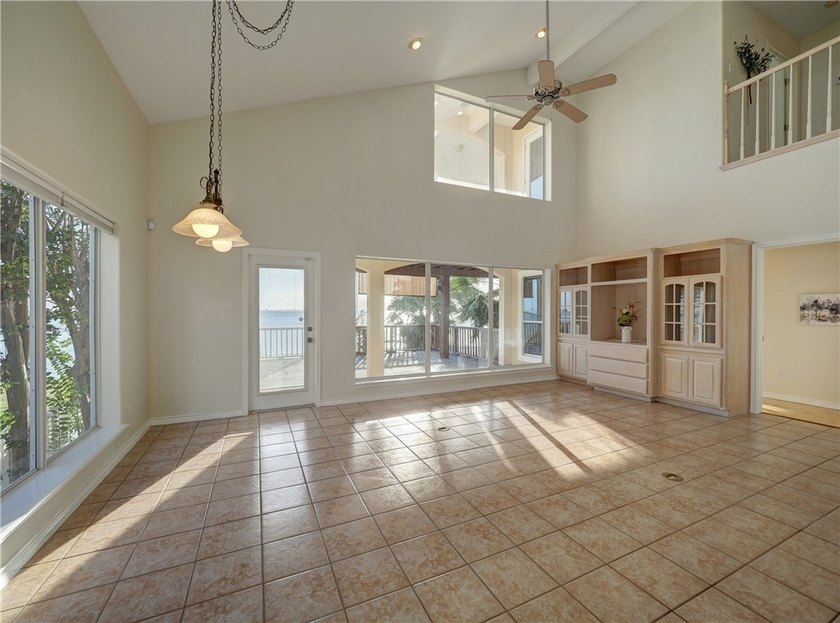 Wake up to breathtaking views of Nueces Bay from this waterfront - photo 12