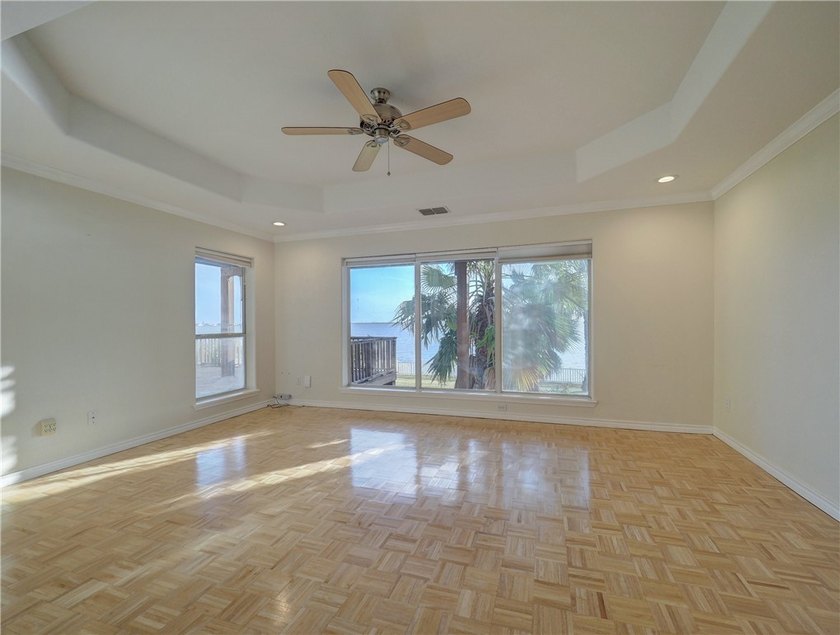 Wake up to breathtaking views of Nueces Bay from this waterfront - photo 21