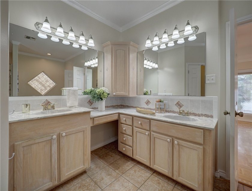 Wake up to breathtaking views of Nueces Bay from this waterfront - photo 24