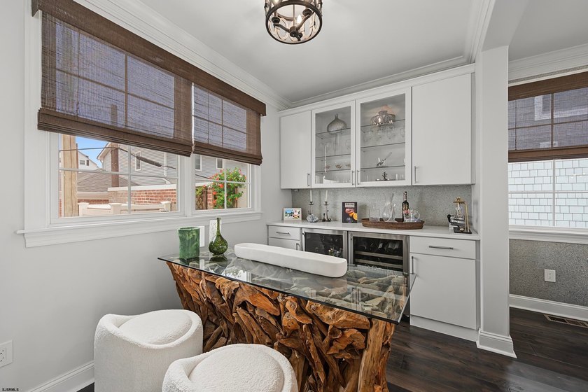 JUST FOUR HOMES FROM THE BEACH! Welcome to one of the most - photo 13