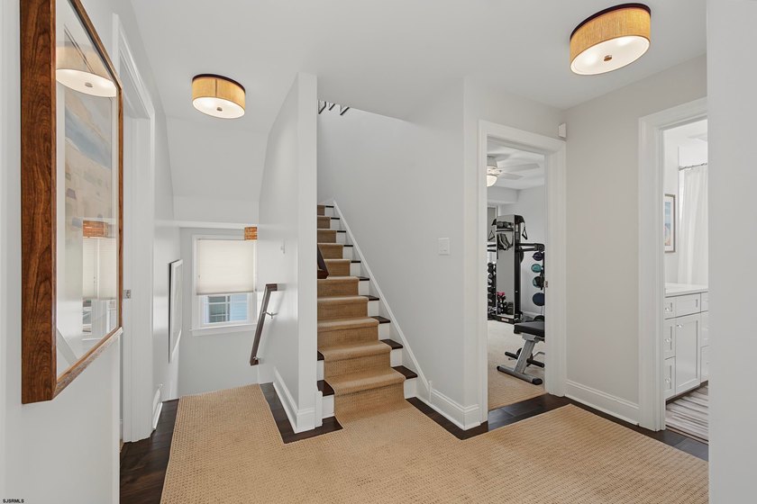JUST FOUR HOMES FROM THE BEACH! Welcome to one of the most - photo 25