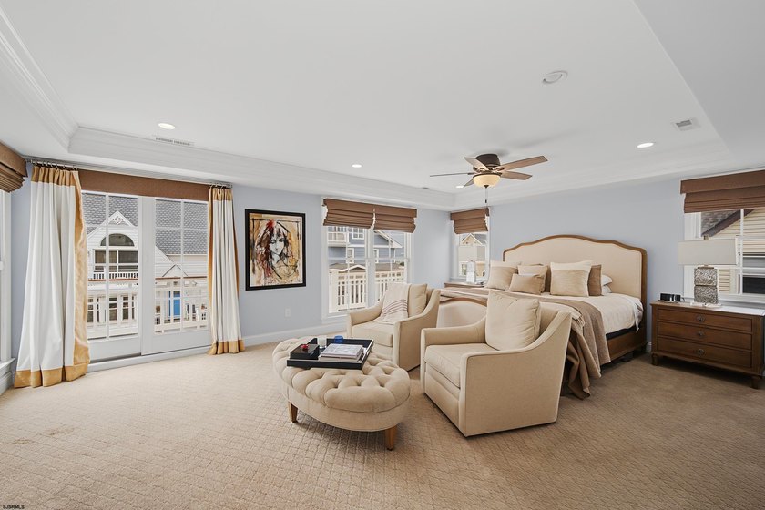 JUST FOUR HOMES FROM THE BEACH! Welcome to one of the most - photo 26