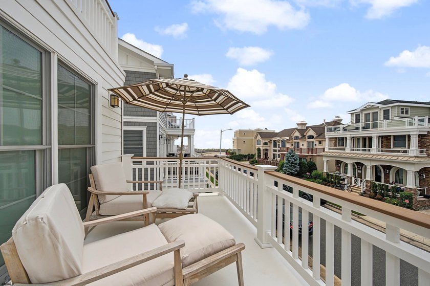 JUST FOUR HOMES FROM THE BEACH! Welcome to one of the most - photo 29
