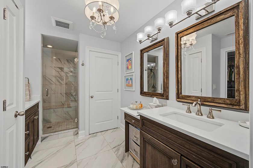 JUST FOUR HOMES FROM THE BEACH! Welcome to one of the most - photo 31