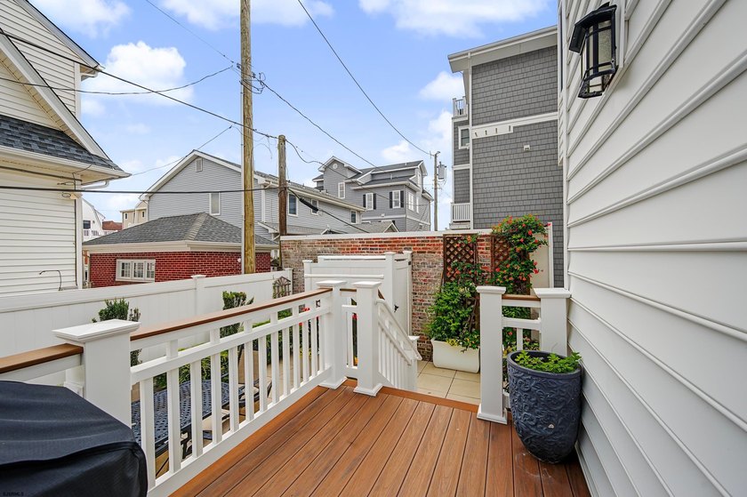 JUST FOUR HOMES FROM THE BEACH! Welcome to one of the most - photo 49