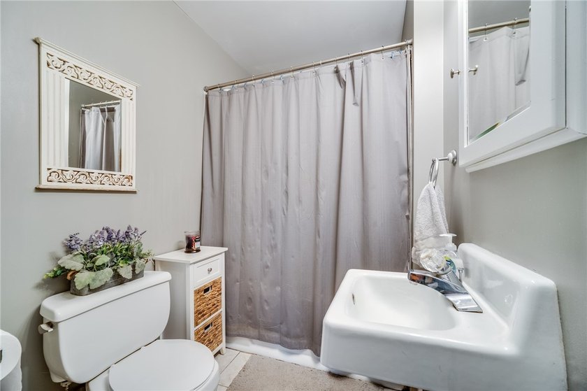 Welcome home to this charming 4-bedroom bungalow, where comfort - photo 9