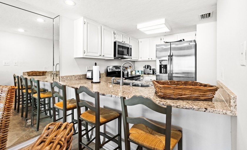 Welcome to the serene beauty of unit 1304 in the beautiful - photo 7