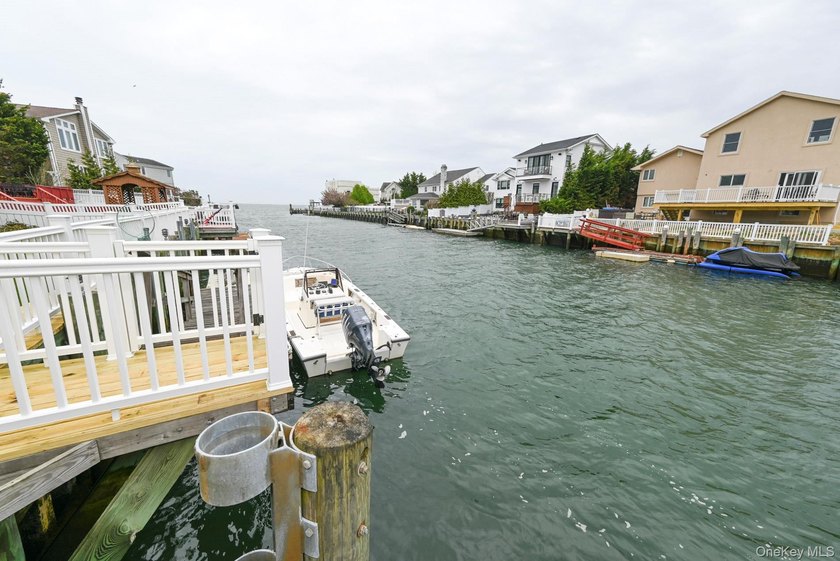 Experience the pinnacle of waterfront living at this spectacular - photo 9
