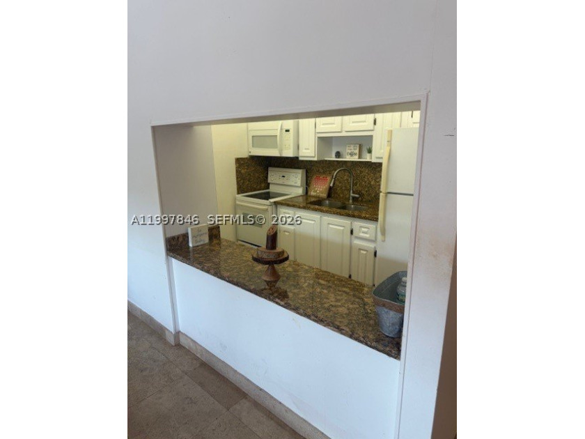 Welcome to Coastal VII Apartments, a well-located condominium in - photo 3