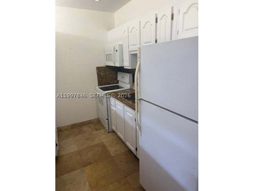 Welcome to Coastal VII Apartments, a well-located condominium in - photo 4