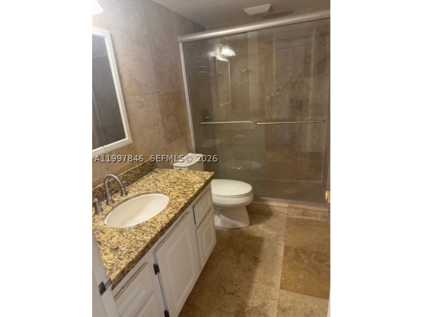 Welcome to Coastal VII Apartments, a well-located condominium in - photo 5