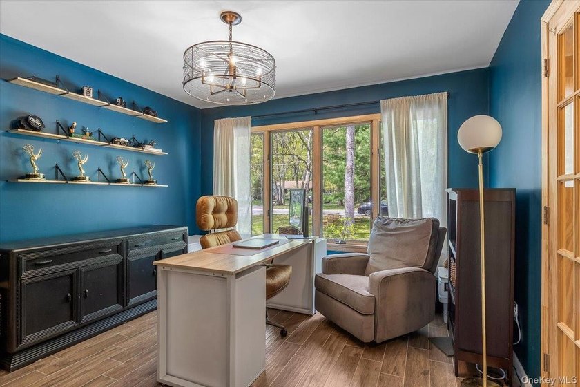 Your out-east living is here! This homey ranch is situated on - photo 5