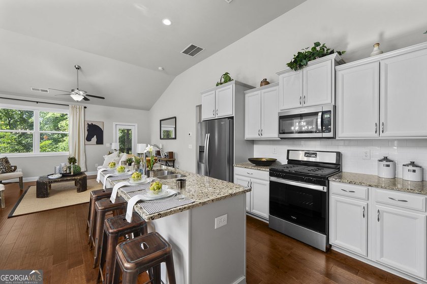 Welcome to Lakeside Garden, a truly one-of-a-kind townhome in - photo 8