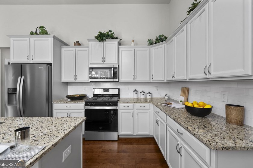 Welcome to Lakeside Garden, a truly one-of-a-kind townhome in - photo 9