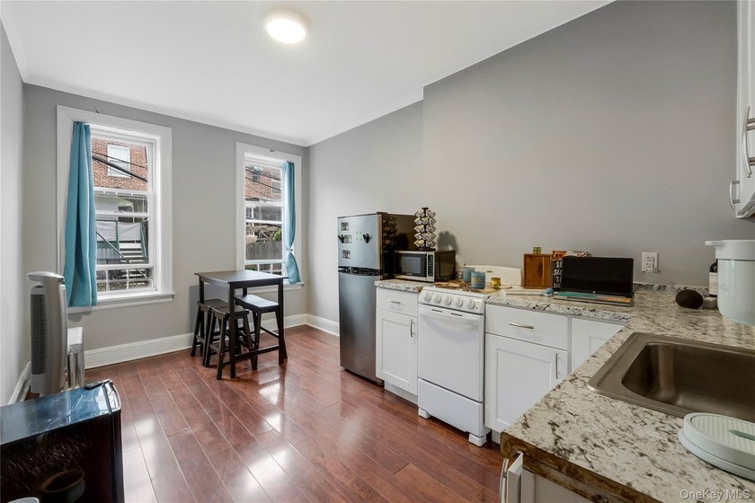 NOT VACANT. TENANT OCCUPIED. Welcome to this prime multifamily - photo 8