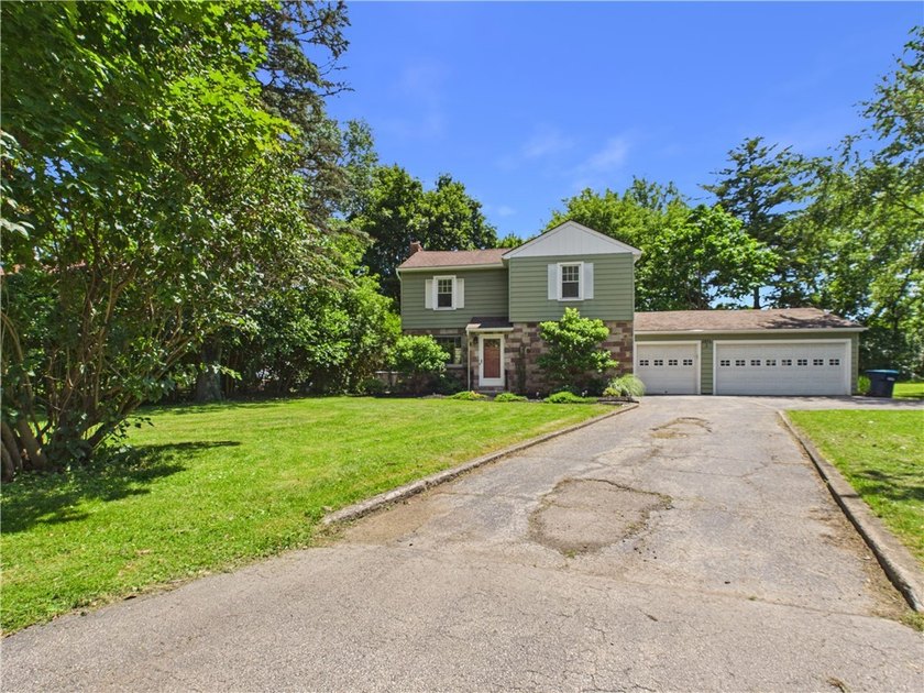 Welcome to this spacious stone-front colonial. Beautiful - photo 2