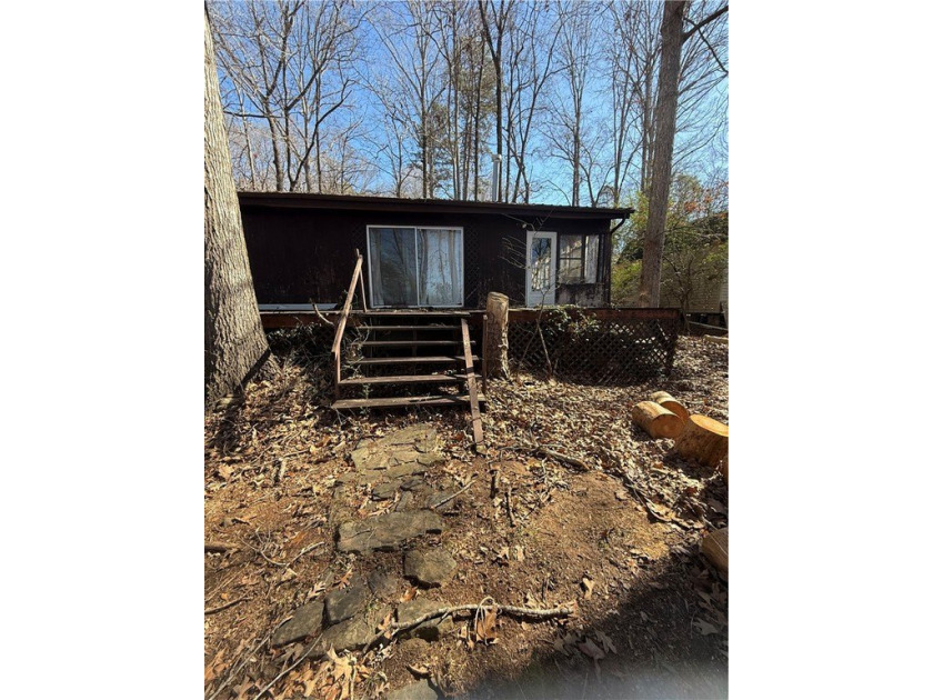 This Legacy Property Awaits Its Next Chapter. Nestled on an - photo 4
