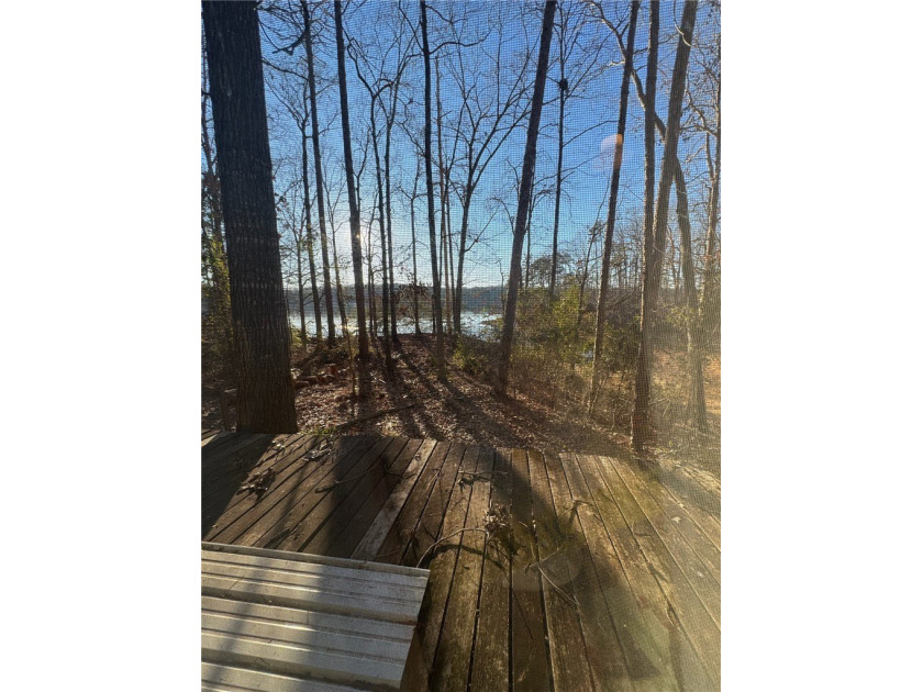 This Legacy Property Awaits Its Next Chapter. Nestled on an - photo 5