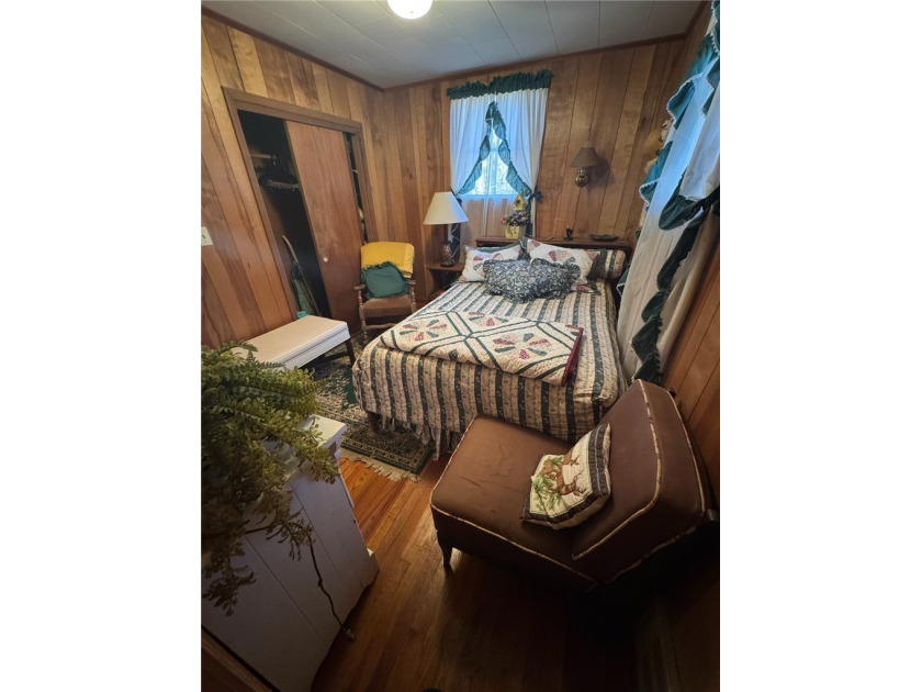 This Legacy Property Awaits Its Next Chapter. Nestled on an - photo 9