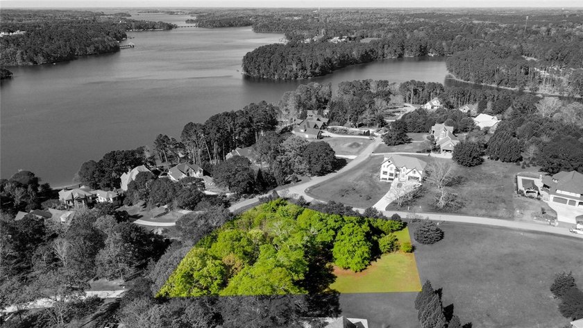 Mostly level with some gentle sloping wooded corner lot in the - photo 6