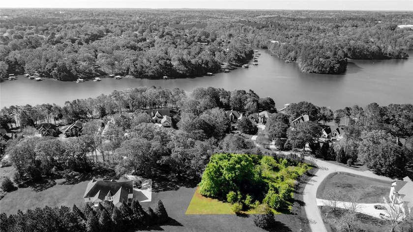 Mostly level with some gentle sloping wooded corner lot in the - photo 7