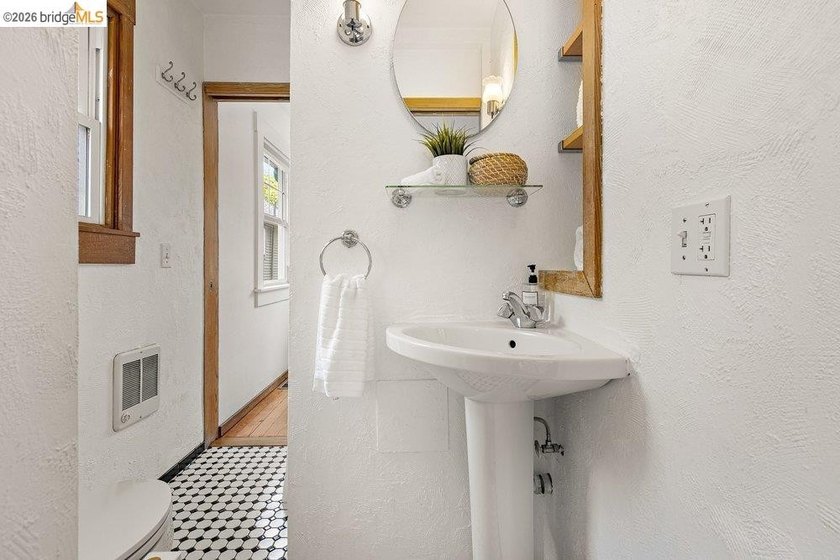 This exceptional 1927 early century cottage presents an - photo 22