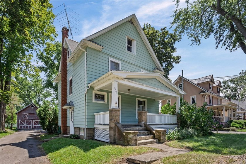 Discover the timeless charm of this 1900s home, rich with - photo 3