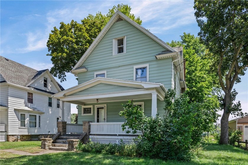Discover the timeless charm of this 1900s home, rich with - photo 4