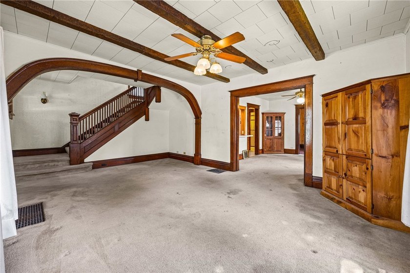 Discover the timeless charm of this 1900s home, rich with - photo 5