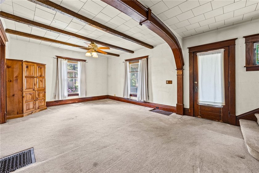 Discover the timeless charm of this 1900s home, rich with - photo 8
