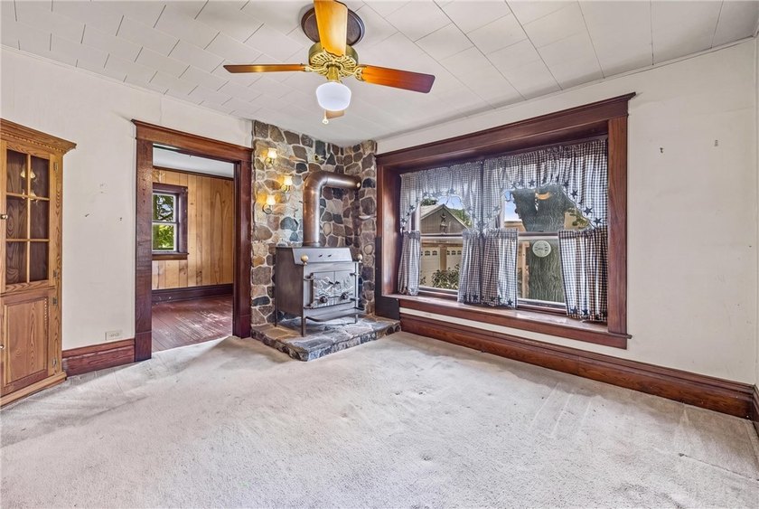 Discover the timeless charm of this 1900s home, rich with - photo 9