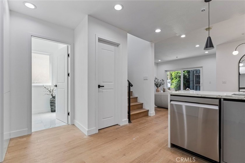 NEW CONSTRUCTION 3 bed, 2.5 bath, three-story townhome with sky - photo 12