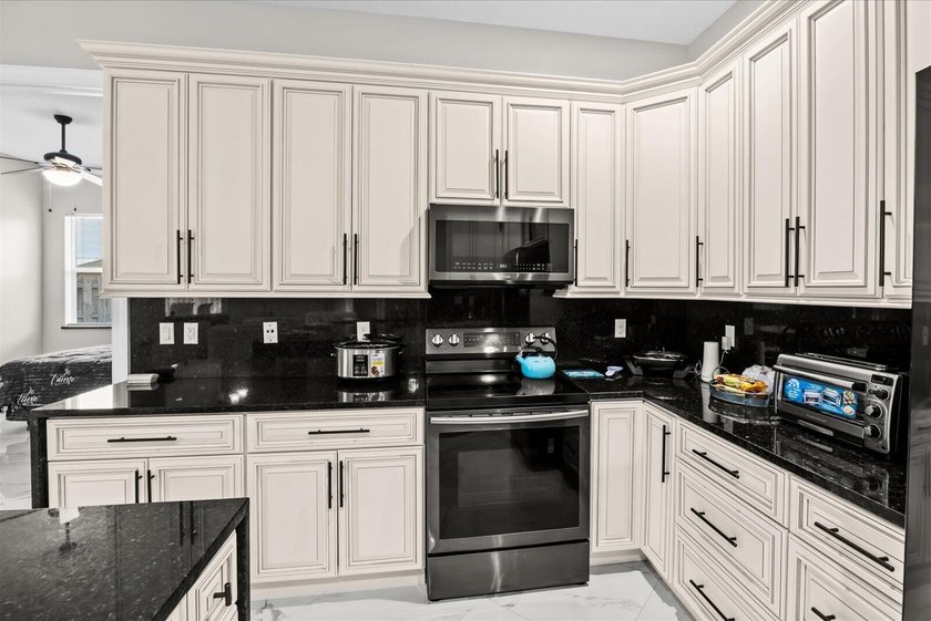 Welcome to this thoughtfully designed single-story residence in - photo 14
