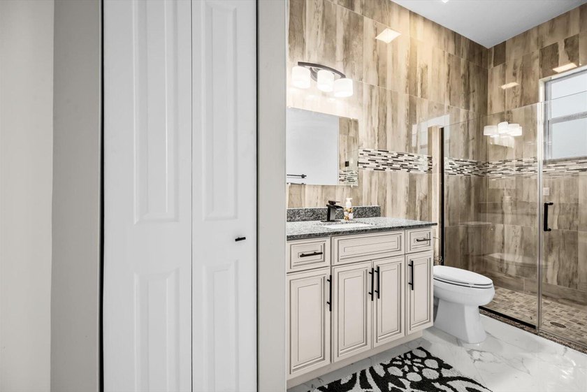 Welcome to this thoughtfully designed single-story residence in - photo 25