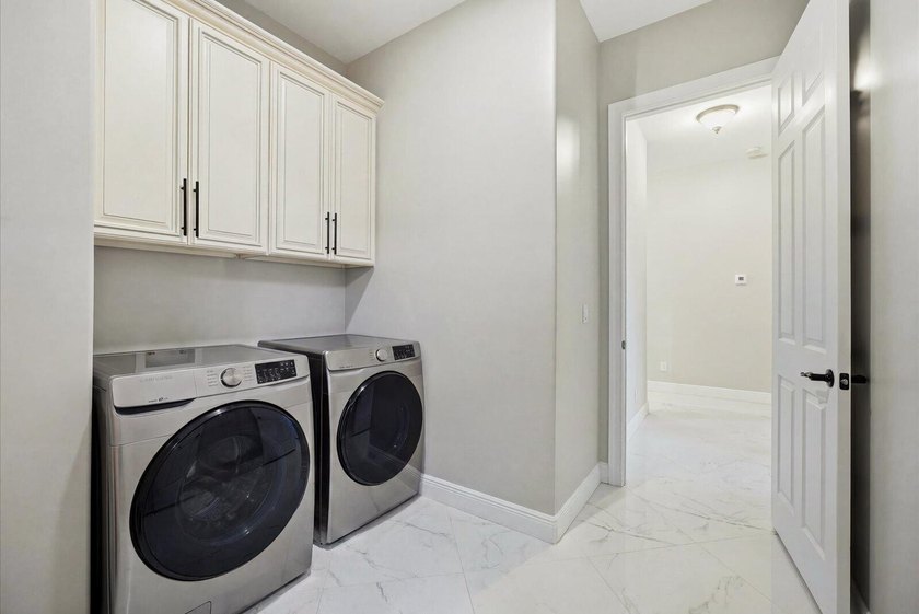 Welcome to this thoughtfully designed single-story residence in - photo 29