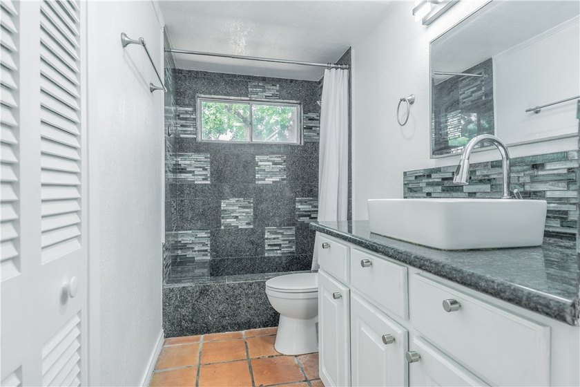 Step into the charm of mid-century living in this beautifully - photo 12