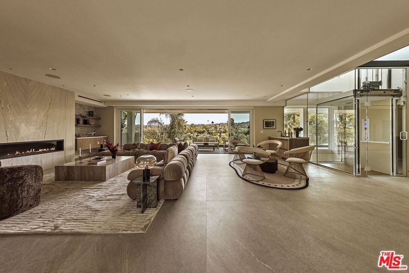 Set in the scenic hills of Encino, this brand-new construction - photo 3