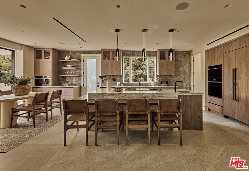 Set in the scenic hills of Encino, this brand-new construction - photo 8