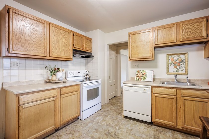Welcome to 77 Boxart Street! A turnkey 4-bedroom/1.5-bath - photo 12
