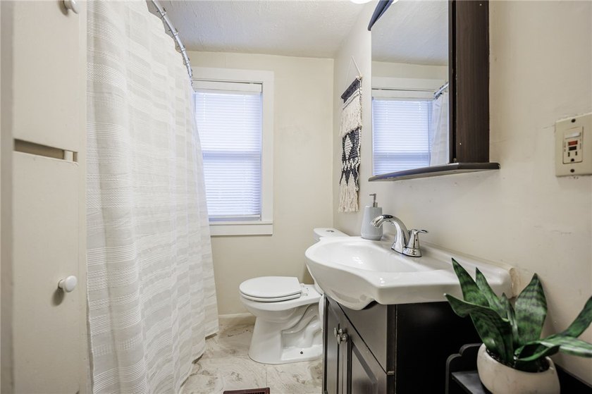 Welcome to 77 Boxart Street! A turnkey 4-bedroom/1.5-bath - photo 23